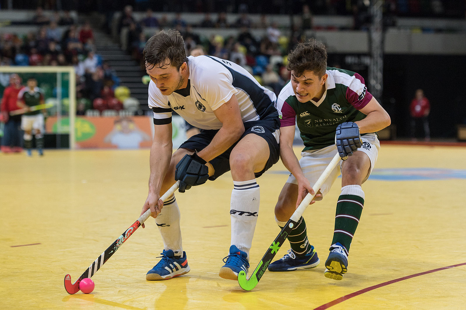 East Grinstead's Simon Faulkner is watched by Johnny Gall of Surbiton. East Grinstead v Surbiton - Jaffa Super6s Semi Final, Copper Box Arena, London, UK on 28 January 2018. Photo: Simon Parker - 2018 01 28 Indoor Men Official Images